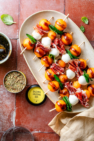 Prosciutto and melon skewers seasoned with Just Spices Balsamic Dressing Mix