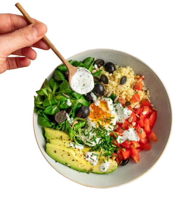 Recipe image: Just Spices yogurt dressing from a salad bowl